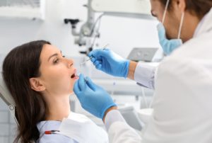 Young Woman Having Check Up In Newest Dental Clinic